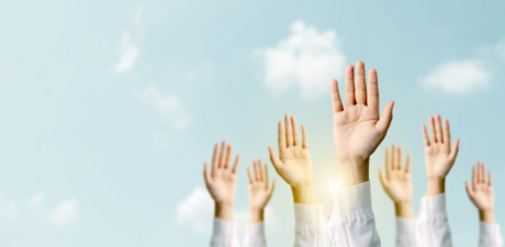 Group,Of,Hand,Businessmen,Raised,The,Sky,With,Sunlight.,International