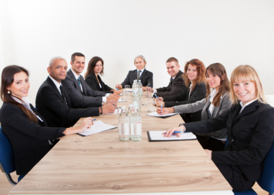 Portrait,Of,A,Serious,Business,Men,And,Women,Attending,A