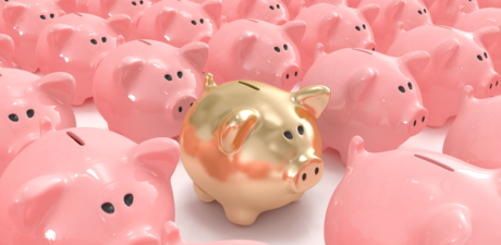Golden,Piggy,Bank,Standing,Out,From,The,Others